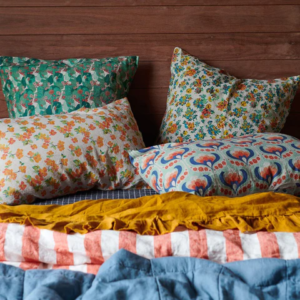 colourful bed linen brand society of wanderers pillowcases and sheets in floral and striped bed linen