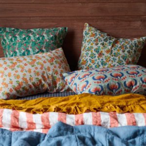 Colourful bed linen brand society of wanderers pillowcases and sheets in floral and striped bed linen