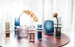 Image showing marmoset found ceramic brand photo shoot with glass vases lined up in a row.